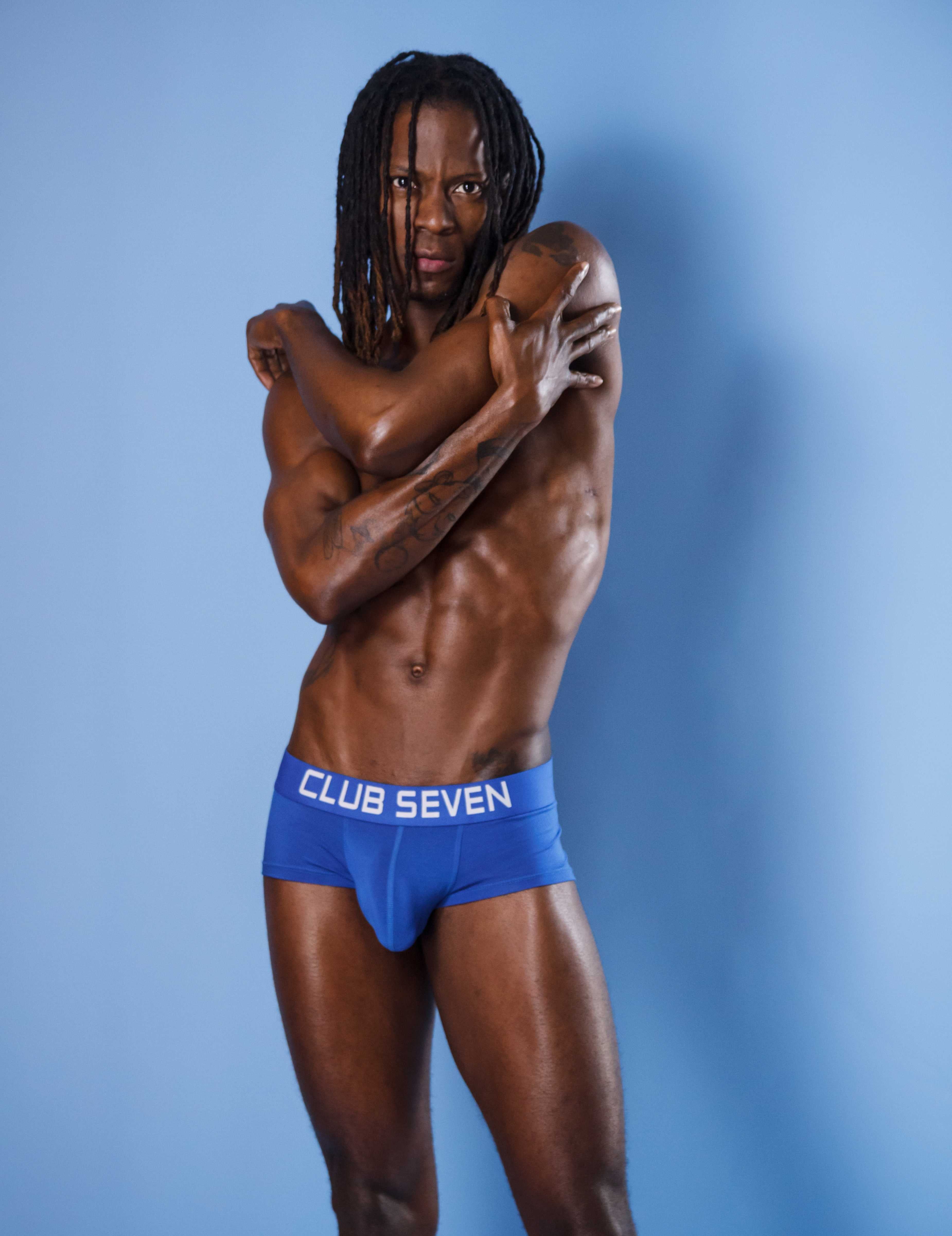 sexy man wearing a pair of men trunks underwear with a big pouch and bulge