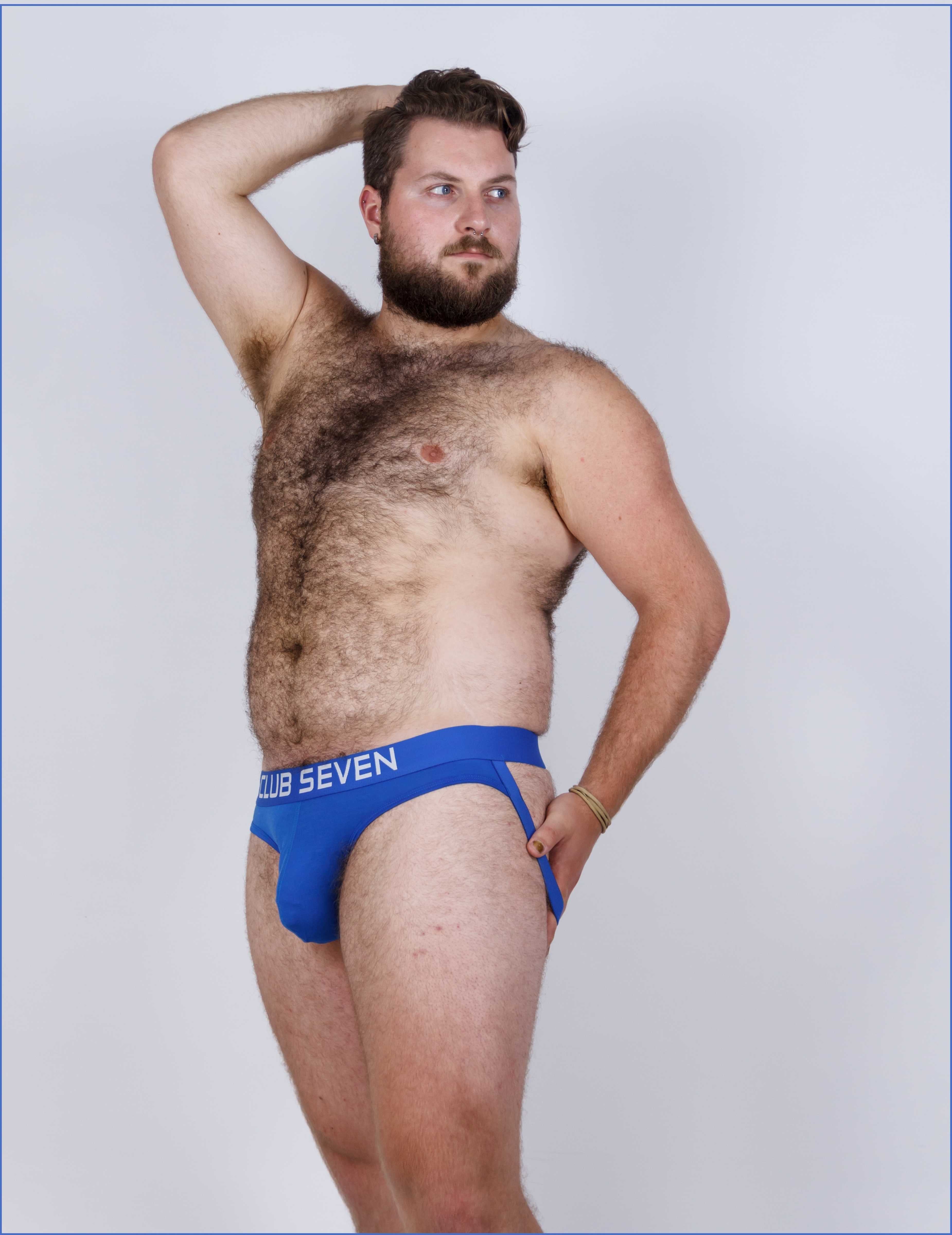 sexy man wearing a pair of men jockstraps underwear with a big pouch and bulge