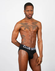 male wearing men underwear briefs in black in the UK.