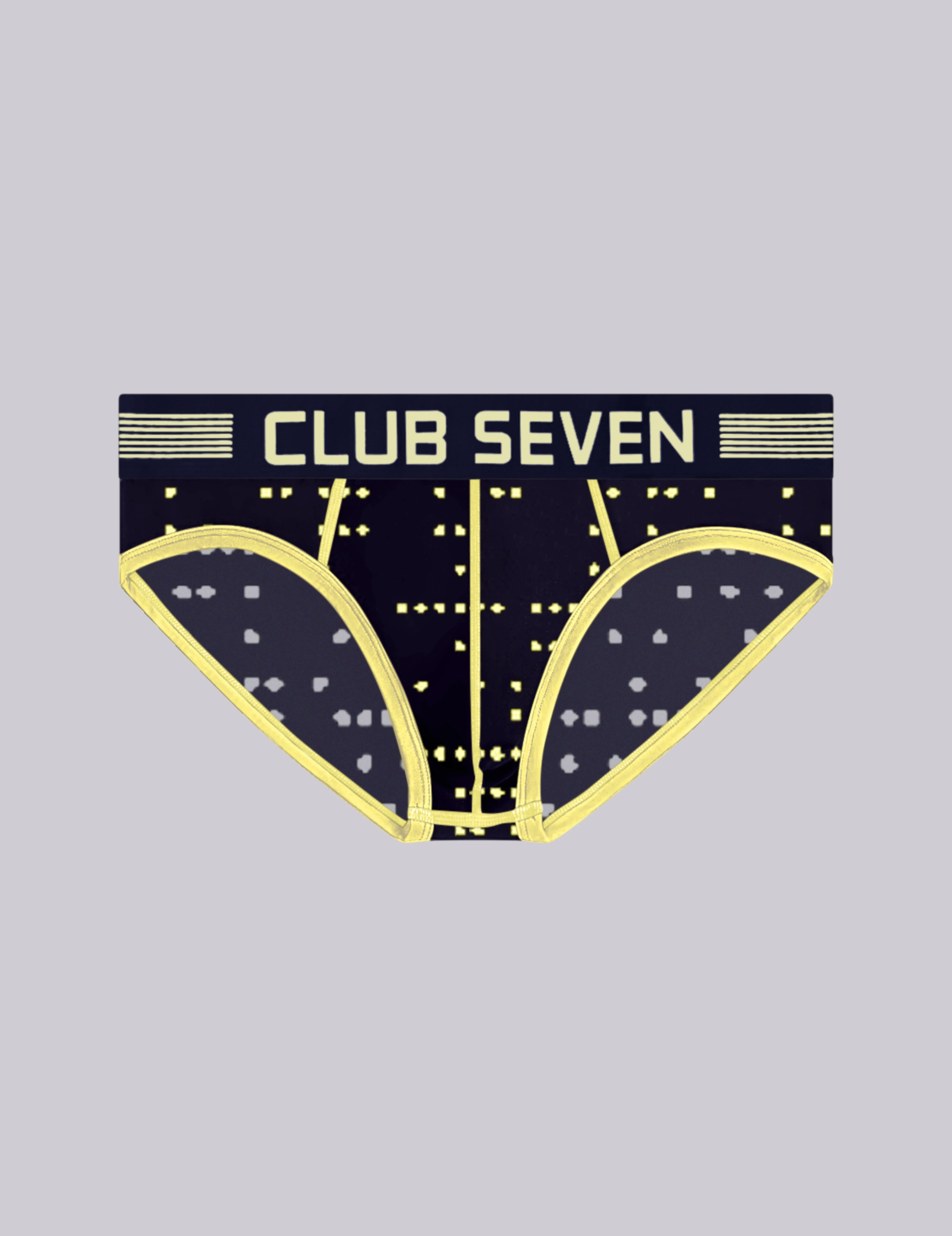 A pair of men's briefs with a large pouch, featuring a dark navy blue base with a yellow geometric star pattern and the brand name 'CLUB SEVEN' printed in yellow across the waistband.