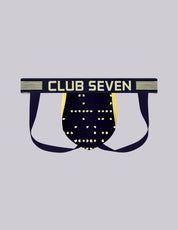 A pair of jockstraps with a large pouch decorated with gold dots and a Braille-style pattern. Featuring a navy blue base with gold accents, designed in the UK