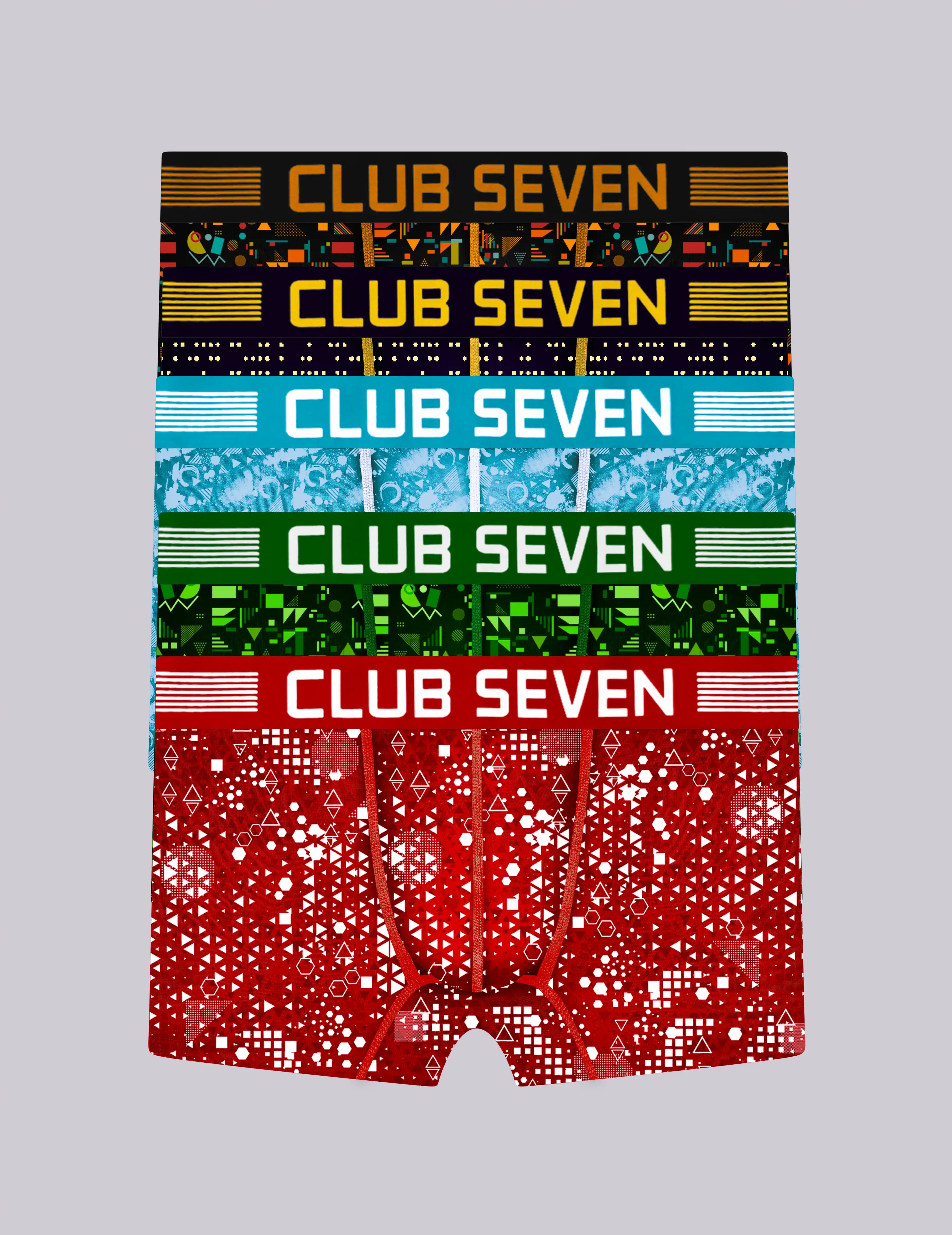 A pair of 5 men's trunks with a vibrant, stacked multicolor pattern featuring the brand name 'CLUB SEVEN' in bold text across different colour bands: black, blue, green, and red.