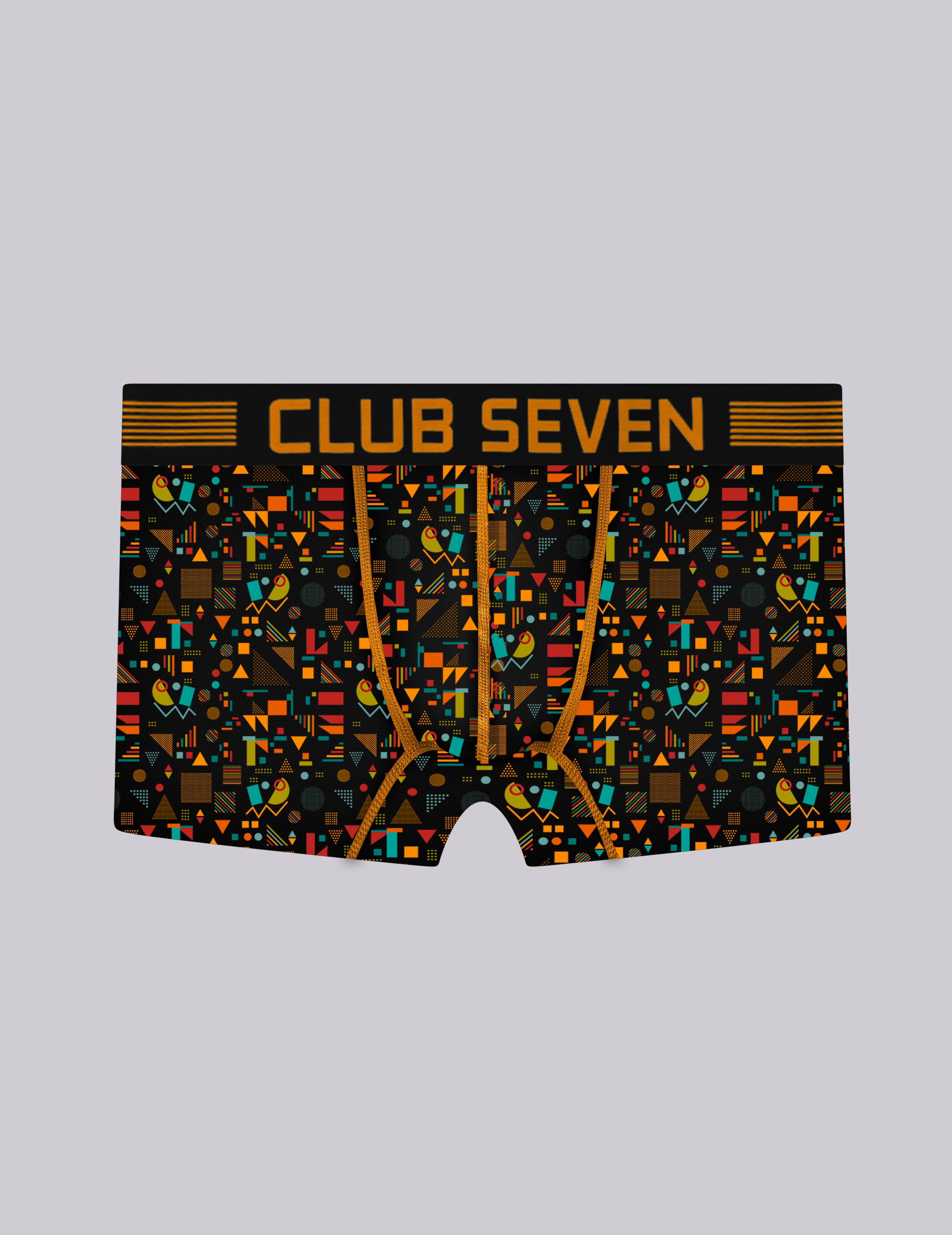 A pair of men's boxer trunks featuring a black background with a vibrant multicolor geometric pattern and the brand name 'CLUB SEVEN' printed in bold gold letters across the waistband.