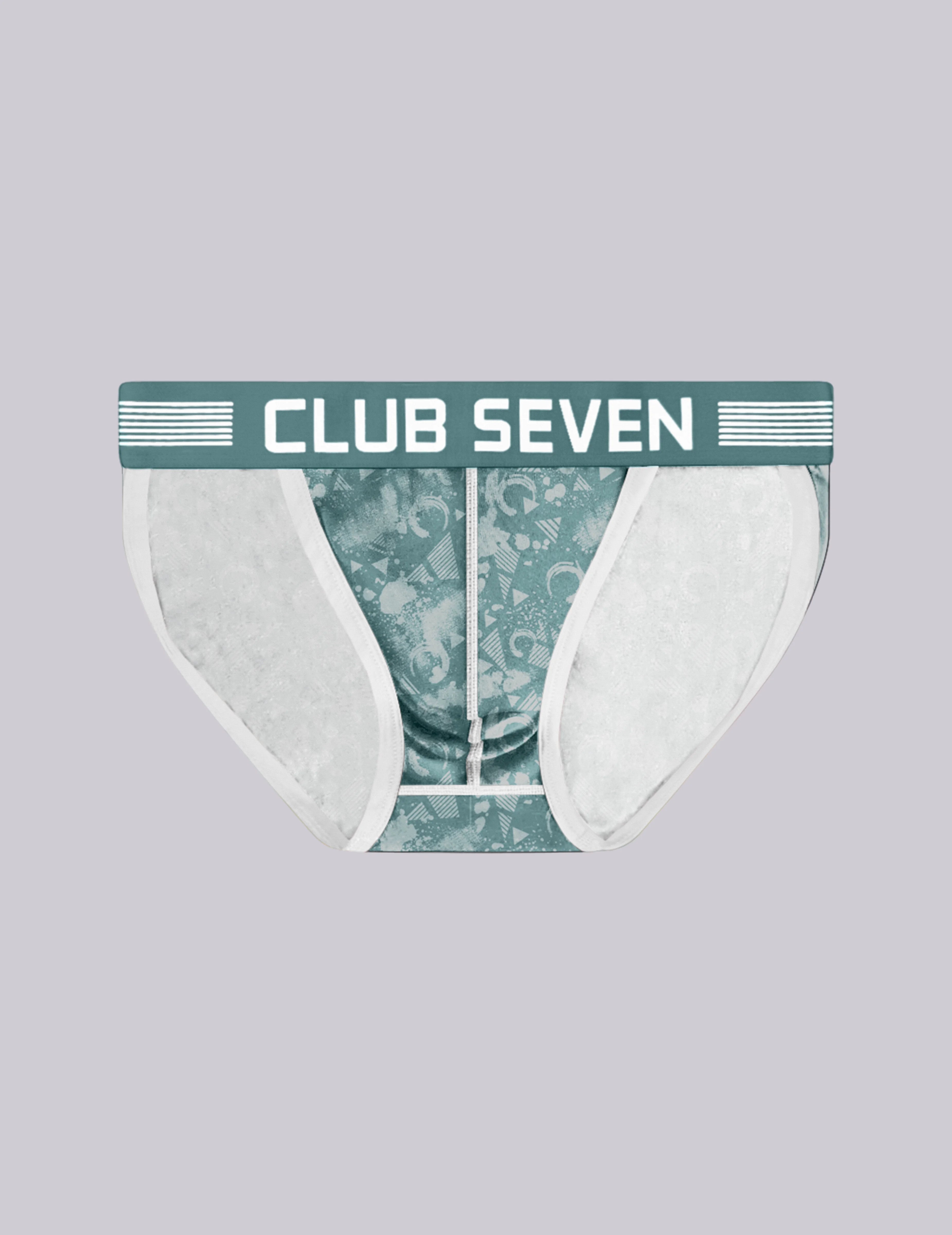 A pair of men's sports briefs by Club Seven, featuring a teal and white floral patterned body, white side panels, and a teal waistband.