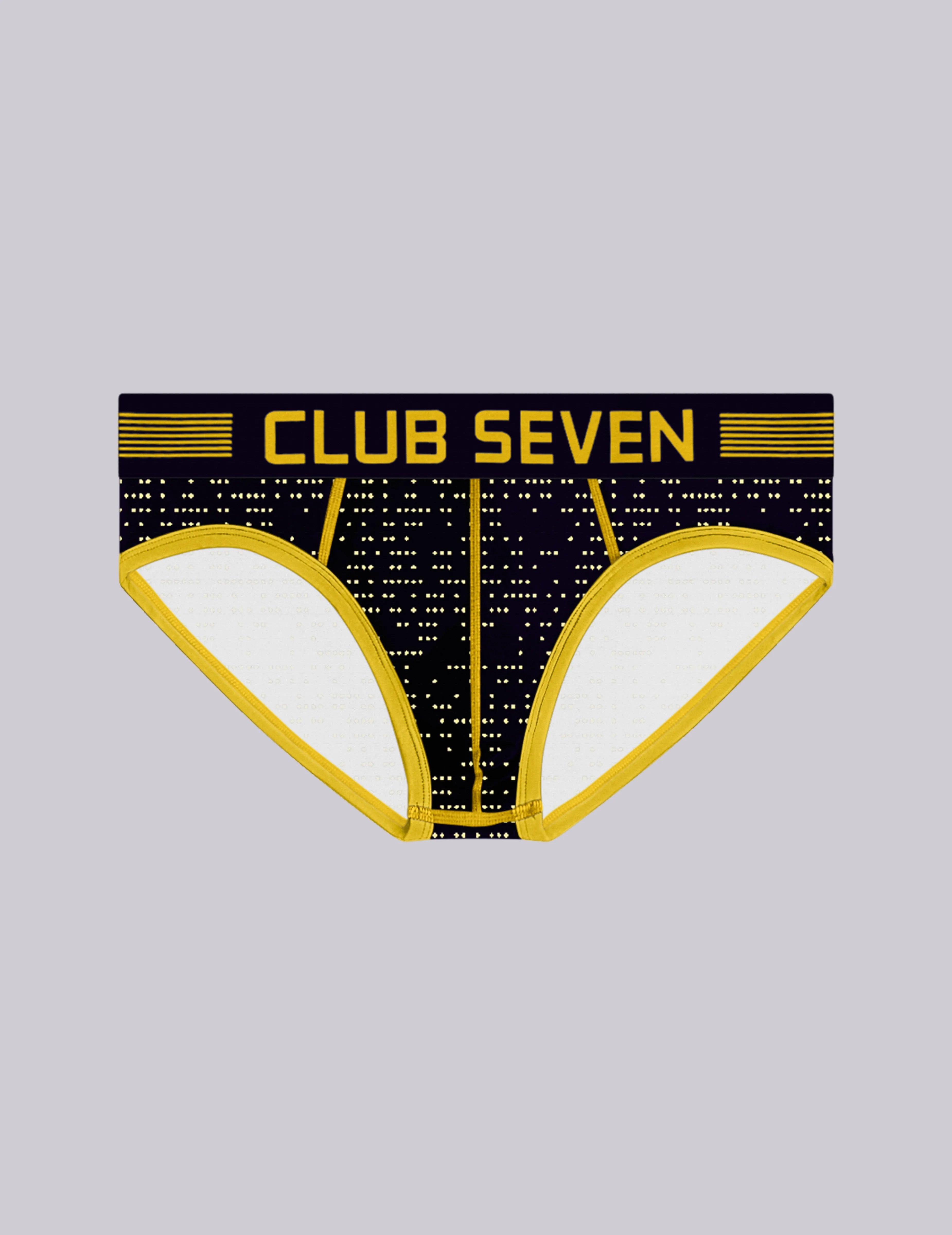 Men's low-rise briefs featuring a black and gold geometric dot pattern with a prominent black waistband 