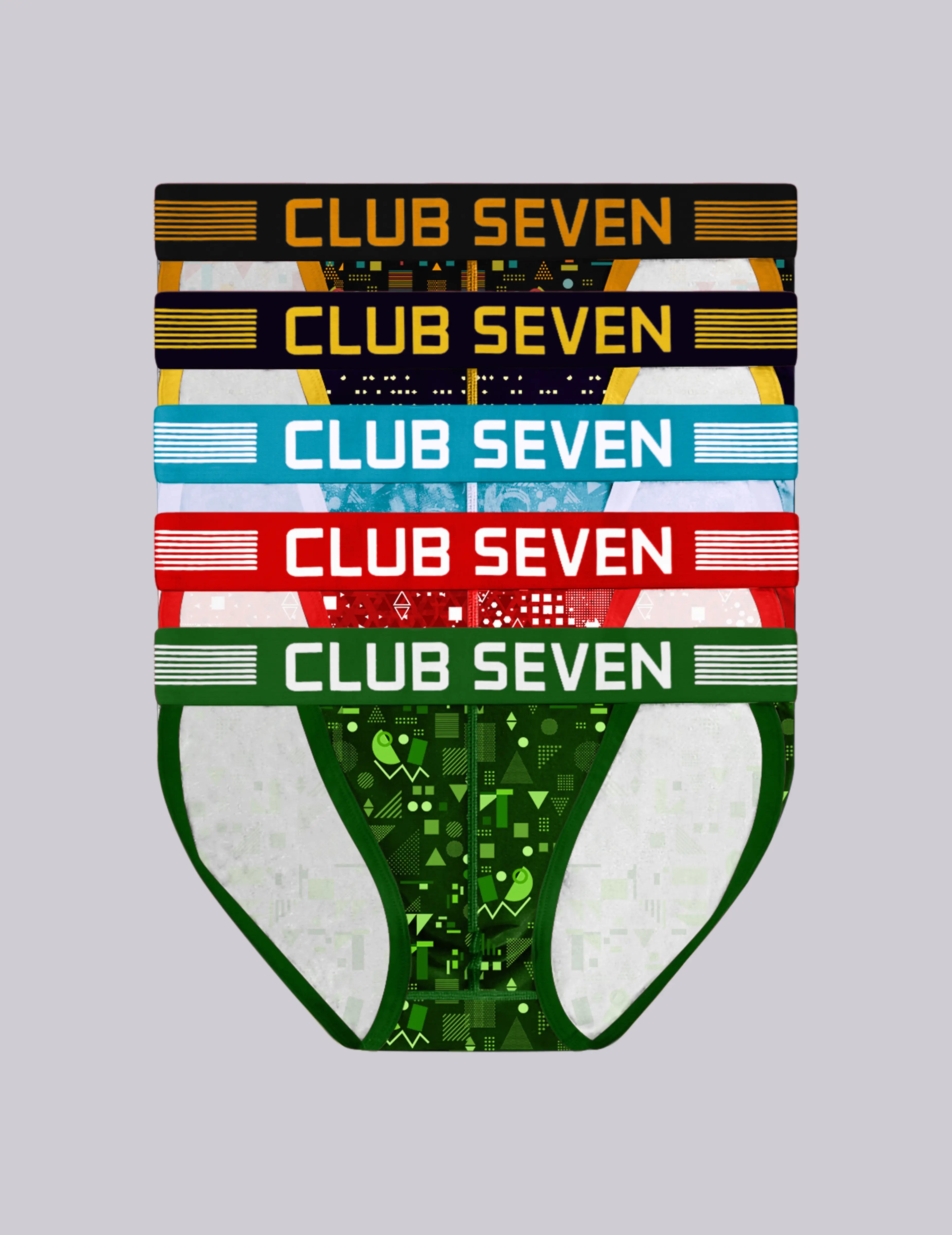 Five pairs of men's tanga sports briefs stacked vertically on a light gray background, each with a different color scheme and a prominent 'CLUB SEVEN' logo on the waistband. The top pair is black with yellow text, the second is navy with white and yellow text, the third is red with white text, and the bottom pair is green with white text.